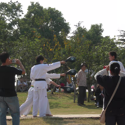 Taekwondo_Outing-018 The taekwondo coach is about to kick three targets in one jump.