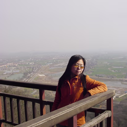 Caishi_Mar_2005-005 Taking in the view from the top.