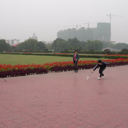 3_Horses_Nov_2005-002 Badminton is played by everyone in China, more than ping pong I think.