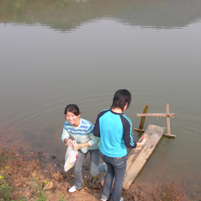 Putang_Outing_Nov_05-003 Washing hands at the clothes washing board.