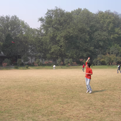 Tourism_Student_Outing-021 Playing Frisbee is always fun.