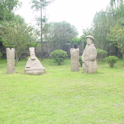 Caishi_Aug_2004-004 Cool statues just hanging out in the grass.