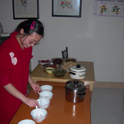 Spring_Festival_06-014 Setting the table for the big dinner to come.