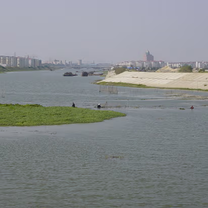 Random-014 A fish farm in a river.