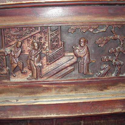 Mudu-17 A carved panel that tells part of the story of how girls were introduced to their husbands.