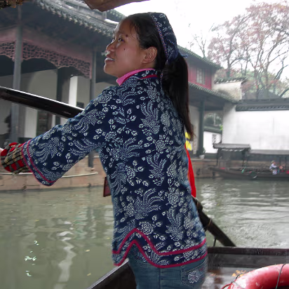 Mudu-22 Our boat girl. She is using a 'Nu' that both steers and propels the boat.