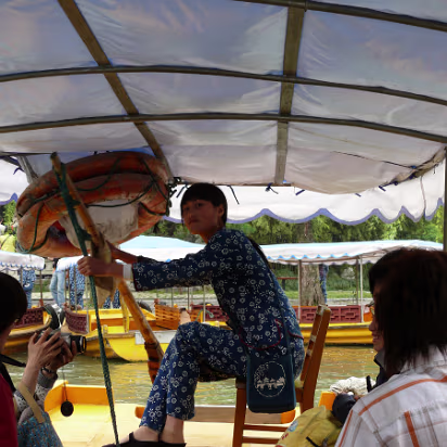 Yangzhou-Apr-07-023 Our boat girl who sang better than she sailed.