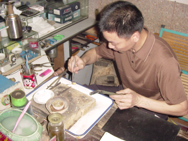 Hefei and Rings We went to Hefei for the civil ceremony. Later, we had our wedding rings made by a craftsman in town.