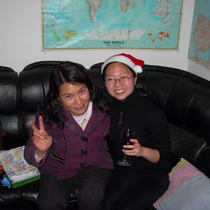 Christmas-2006-08 Xiaohua and Hanhan with some Christmas cheer.