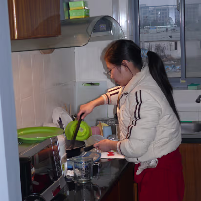 Gary's-50th-Birthday-01 Hanhan is cooking my delicious birthday dinner.