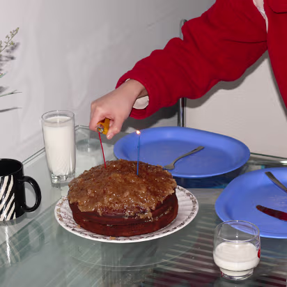 Gary's-50th-Birthday-04 Hanhan lights the candles on the only German Chocolate cake in China.