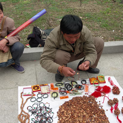 Peach-Festival-12 Peach pit carvings of every animal year critters. We bought a couple of course.