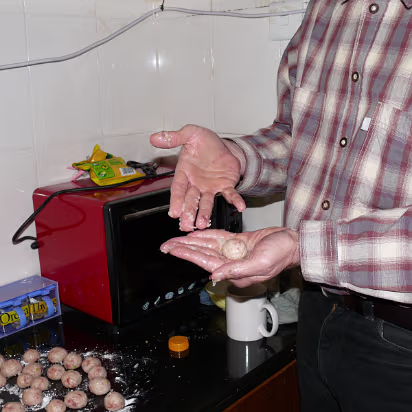 Spring-Festival-2007-009 Gary making the perfect meatball. Notice the oily hands, the rice would stick otherwise.