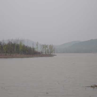 Tai-Lake-09 View across Tai Lake to Turtle Head island and mountains.