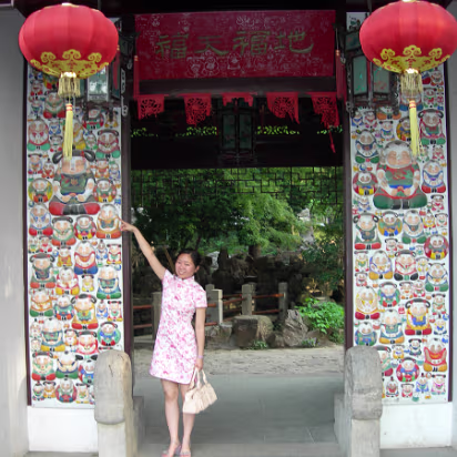 Xi-Hui-Park-16 The figures around the door are the famous Wuxi figurines. They are made from the clay found locally.