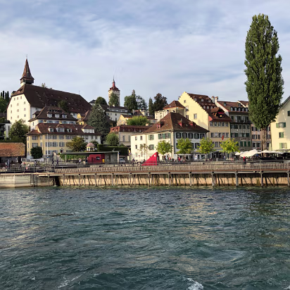 Switzerland-032 No matter where you look, the views are great. European/Swiss buildings, the defense and church towers, people strolling about.