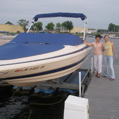 Family_Fun_Day-003 Hanhan and mom sneaking into a boat.