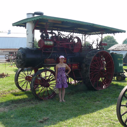 Indiana_State_Fair-003 Hanhan in front of an old steam tractor.