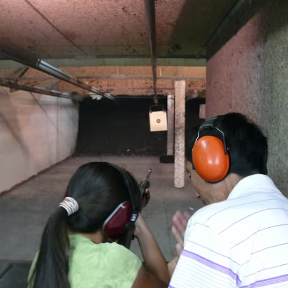 Shooting_Range-003 Giving shooting advice to Hanhan.