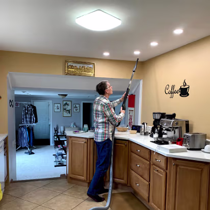 Covid-012 It's only been a few days and Gary has lost it, vacuuming the celling.