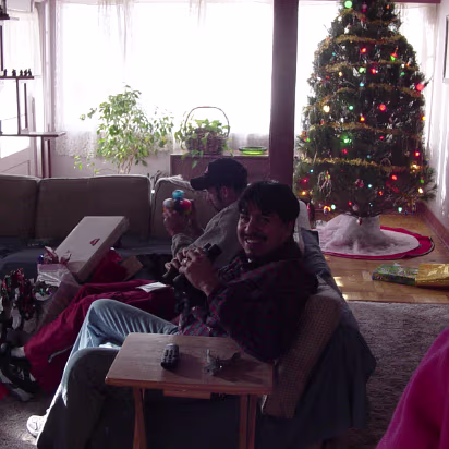 Christmas_2003-009 Two happy guys unwrapping gifts on Christmas Morning at Linda's