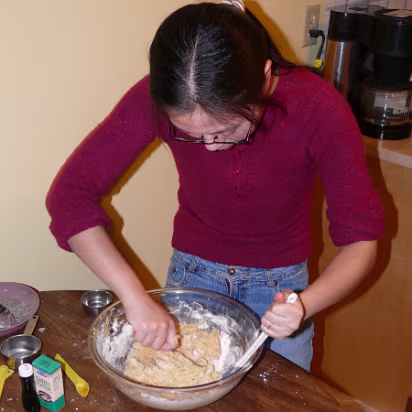 Christmas_2007-026 Mixing another batch of chocolate chip cookies.