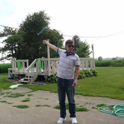 Independence_Day-004 Gary shooting a bottle rocket from his hand.