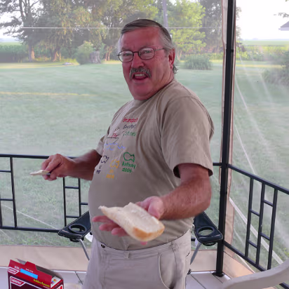 Independence_Day-019 Don preparing a sandwich with his special technique.