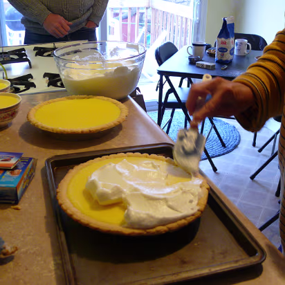 Thanksgiving_2007-011 Covering the filled shells with the meringue.