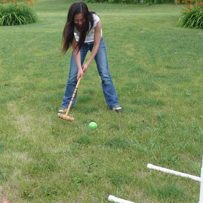 USA_Move-037 Hanhan playing croquet for the first time.