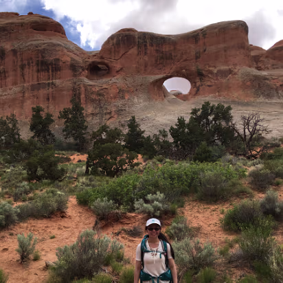 Arches_NP-043 One arch is there, the other to its left is just forming. Hanhan has the water to wait until it is done.
