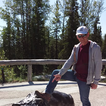 Alaska-063 Bronze sleeping grizzly. Lucky for Hanhan.