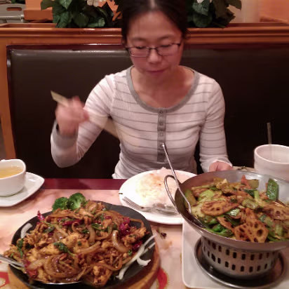 Christmas_2015_Trip-004 Christmas dinner was sichuan, very spicy and delicious. Look at how fast Hanhan was eating, the chopsticks were a blur!