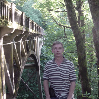 Oregon-031 Me, standing under an old stone bridge.